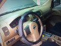 Silver Nissan Frontier Navara 2013 at 97000 km for sale-2