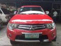 Red Mitsubishi Strada 2011 at 67256 km for sale-8