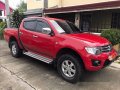 Red Mitsubishi Strada 2014 Automatic Diesel for sale -7