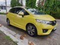 Yellow Honda Jazz 2015 Hatchback at 45000 km for sale -1