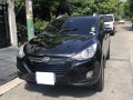 Selling Black Hyundai Tucson 2011 at 62000 km -8