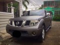 Silver Nissan Frontier Navara 2013 at 97000 km for sale-4