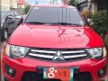 Red Mitsubishi Strada 2014 Automatic Diesel for sale -9