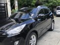 Selling Black Hyundai Tucson 2011 at 62000 km -7