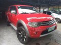 Red Mitsubishi Strada 2011 at 67256 km for sale-9