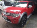 Red Mitsubishi Strada 2011 at 67256 km for sale-7