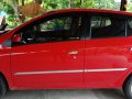 Red Toyota Wigo 2015 Hatchback for sale in Batangas-1