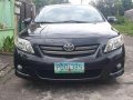 Black Toyota Corolla Altis 2010 at 160000 km for sale -4