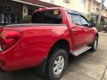 Red Mitsubishi Strada 2014 Automatic Diesel for sale -3