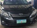 Black Toyota Corolla Altis 2010 at 160000 km for sale -1
