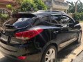 Black Hyundai Tucson 2011 Automatic Gasoline for sale -15