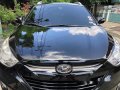 Black Hyundai Tucson 2011 Automatic Gasoline for sale -17