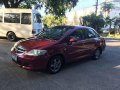 Red Honda City 2006 at 59000 km for sale -0