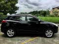 Black Hyundai Tucson 2012 at 50000 km for sale -7