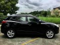 Black Hyundai Tucson 2012 at 50000 km for sale -2