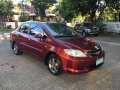 Red Honda City 2006 at 59000 km for sale -0