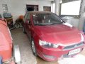 Selling Red Mitsubishi Lancer Ex 2014 Manual Gasoline at 69752 km -0