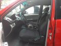 Red Mitsubishi Strada 2011 at 67256 km for sale-2