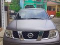 Silver Nissan Frontier Navara 2013 at 97000 km for sale-2