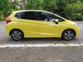 Yellow Honda Jazz 2015 Hatchback at 45000 km for sale -2