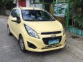Yellow Chevrolet Spark 2013 Hatchback for sale in Manila -3