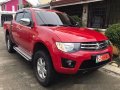 Red Mitsubishi Strada 2014 Automatic Diesel for sale -1