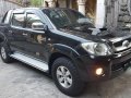 Selling Black Toyota Hilux 2010 at 85000 km -0