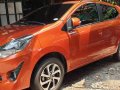Orange Toyota Wigo 2019 Manual Gasoline for sale -3