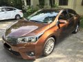 Brown Toyota Corolla 2014 for sale in Quezon City-3