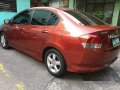 Red Honda City 2009 at 94000 km for sale -5