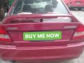 Selling Red Mitsubishi Lancer 1997 at 100000 km -1