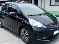 Black Honda Jazz 2012 at 45512 km for sale in Malolos -1