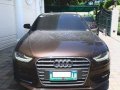 Brown Audi A4 2013 at 67000 km for sale-1