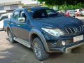 Black Mitsubishi Strada 2017 Automatic Diesel for sale -0