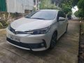 Selling White Toyota Corolla Altis 2018 Automatic Gasoline at 7000 km -1