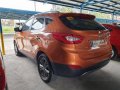 Orange Hyundai Tucson 2014 Automatic Gasoline for sale-2