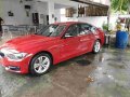 Red Bmw 320D 2013 at 19500 km for sale -0