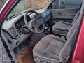 Selling Red Kia Carnival 2003 Manual Diesel in Baguio -1