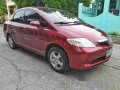 Red Honda City 2004 at 180000 km for sale-1