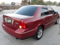 Selling Red Ford Lynx 2005 Automatic Gasoline -0