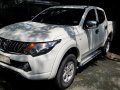 Selling White Mitsubishi Strada 2015 Manual Diesel -0