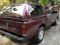 Red Nissan Frontier 2013 at 62000 km for sale -1