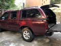 Red Nissan Frontier 2013 at 62000 km for sale -2
