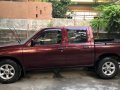 Red Nissan Frontier 2013 at 62000 km for sale -3