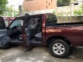 Red Nissan Frontier 2013 at 62000 km for sale -4