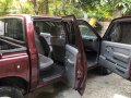 Red Nissan Frontier 2013 at 62000 km for sale -5