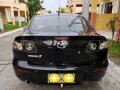 Black Mazda 3 2010 at 100000 km for sale-1