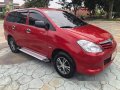 Red Toyota Innova 2010 Manual Diesel for sale-9