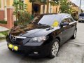 Black Mazda 3 2010 at 100000 km for sale-3