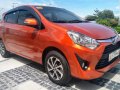 Orange Toyota Wigo 2019 Hatchback for sale in Pampanga -1
